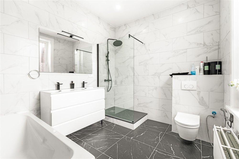 Volledig instapklare woning met 4 slaapkamers, 2 badkamers en grote buitenruimte op centrale locatie te Oostende - foto 5