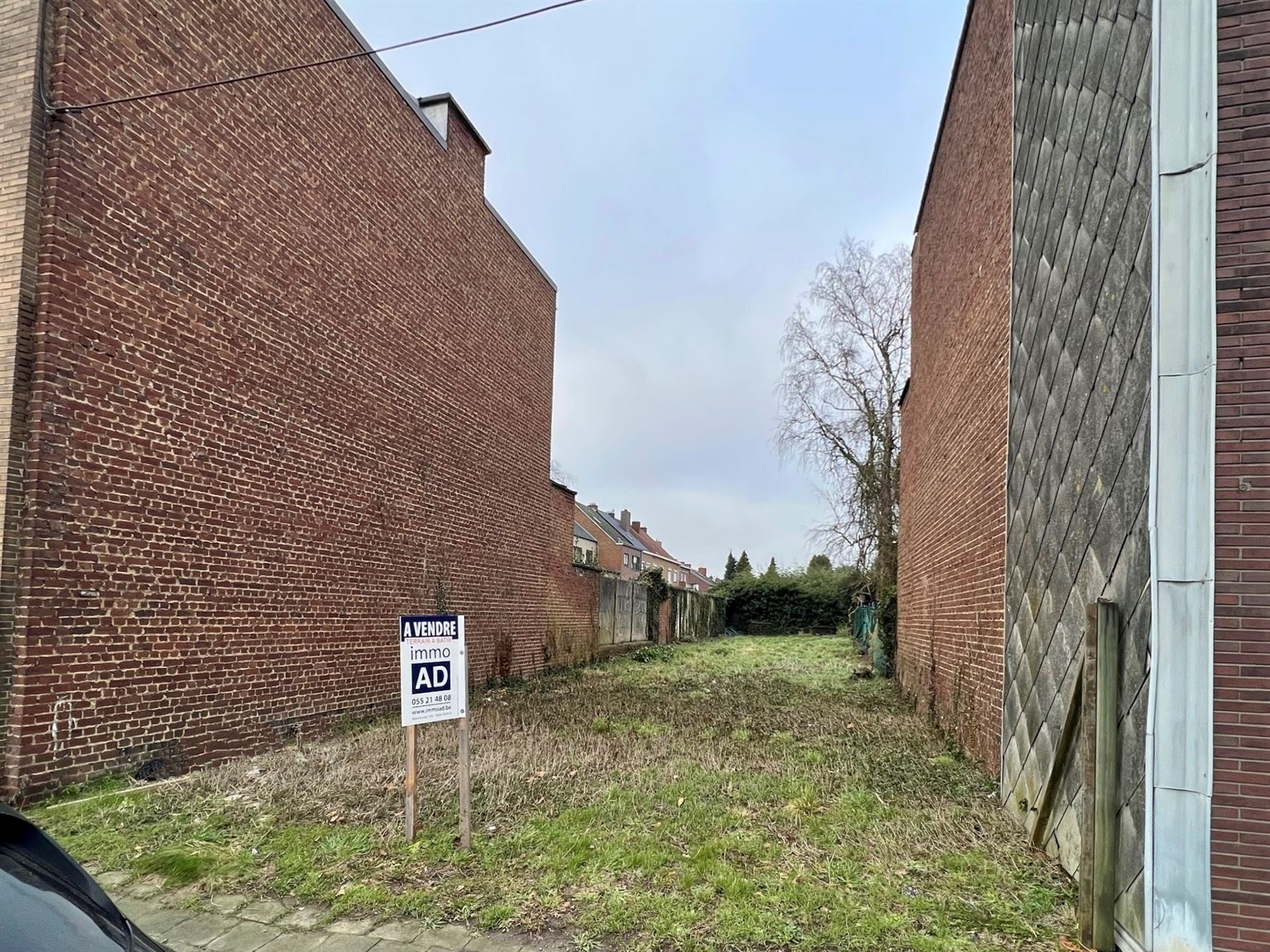 Mooi perceel bouwgrond voor stadswoning met tuin in het centrum van Ronse - foto 1