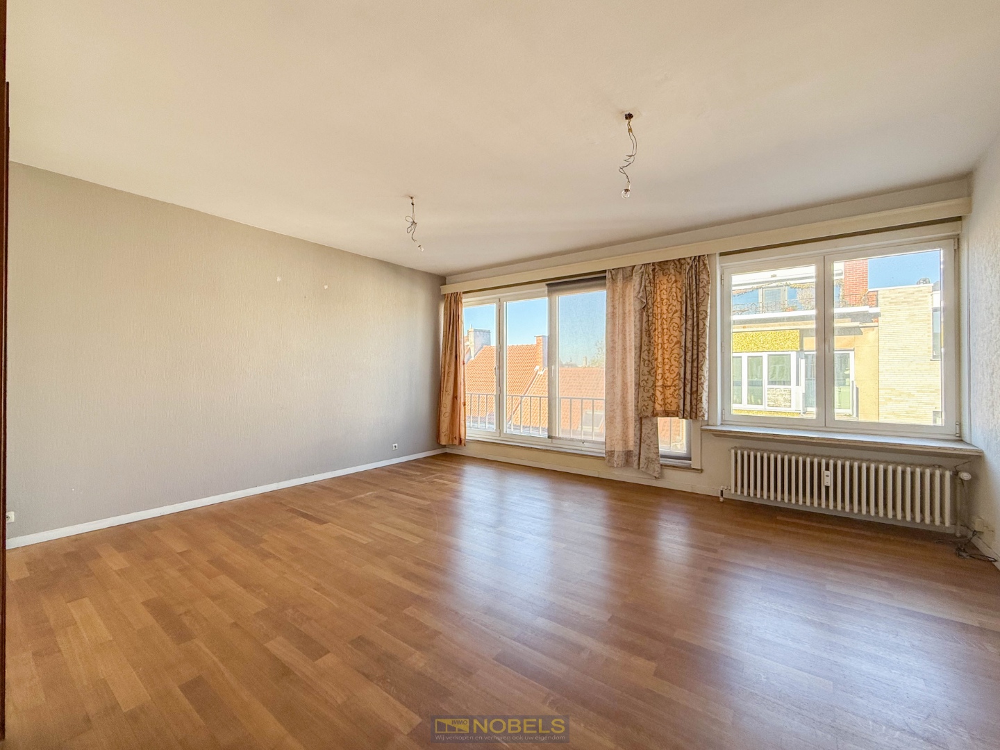 Te koop, lichtrijk 2-slaapkamerappartement met terras aan het Ledebergplein - foto 1