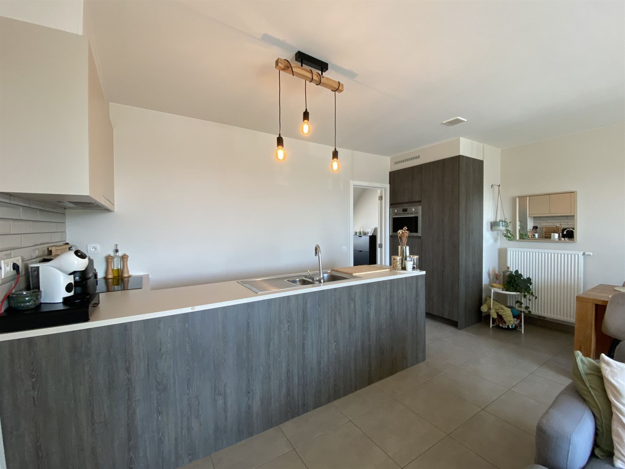 Prachtig energiezuinig dakappartement met 2 slaapkamers, ruim zonovergoten terras en garage in hartje Ertvelde - foto 5