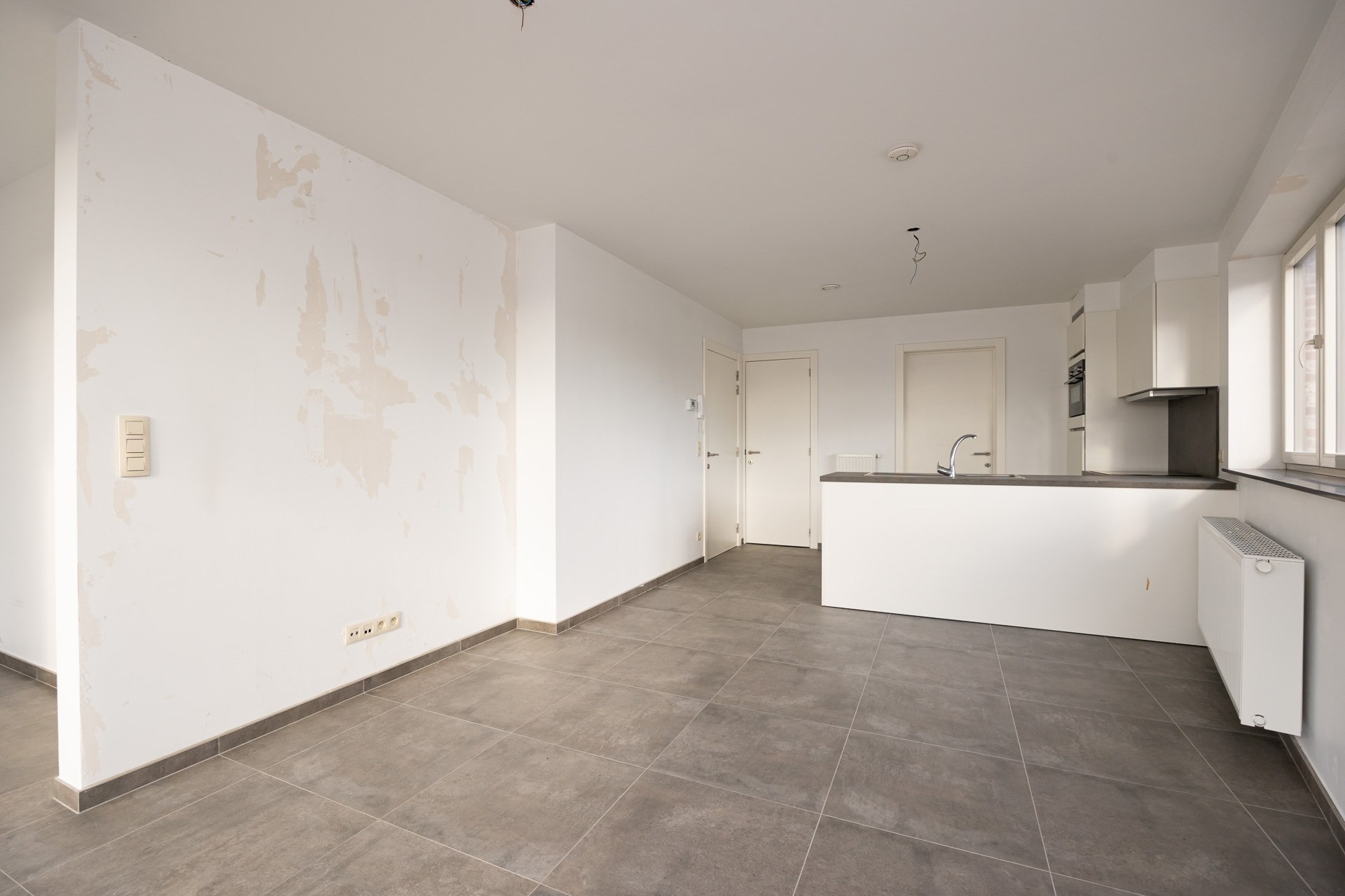 Appartement met 1 slaapkamer en autostaanplaats in het centrum van Kemzeke - foto 4