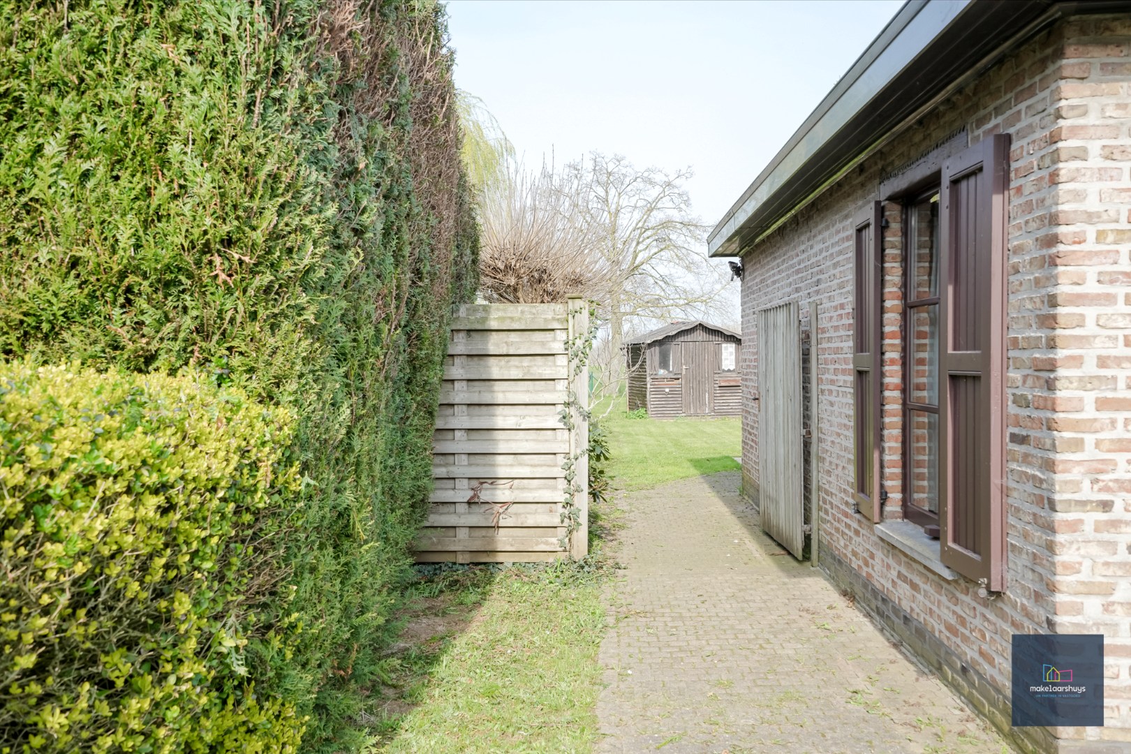 Ruime  halfopen bebouwing  met  zonnige tuin, terras en garage in Waarschoot - foto 3