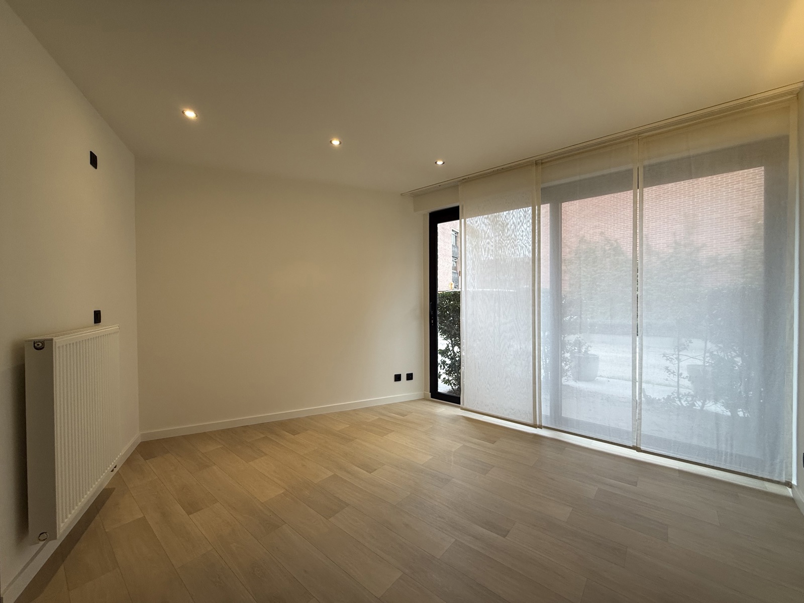 Modern gelijkvloers appartement met tuin in het hart van Geel - foto 4