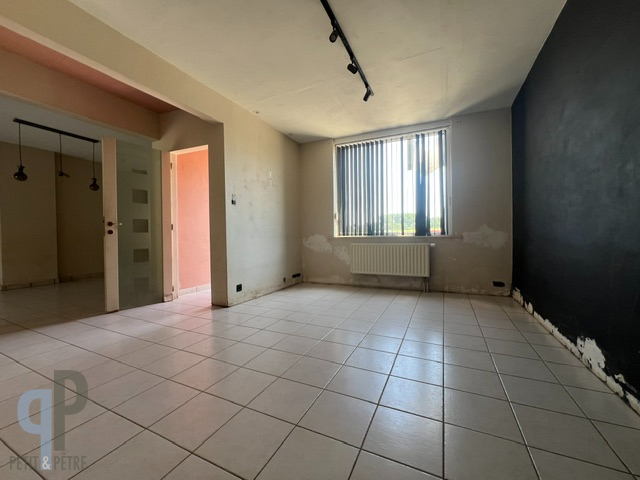Te renoveren woning met 3 slaapkamers, garage en tuin - photo 2