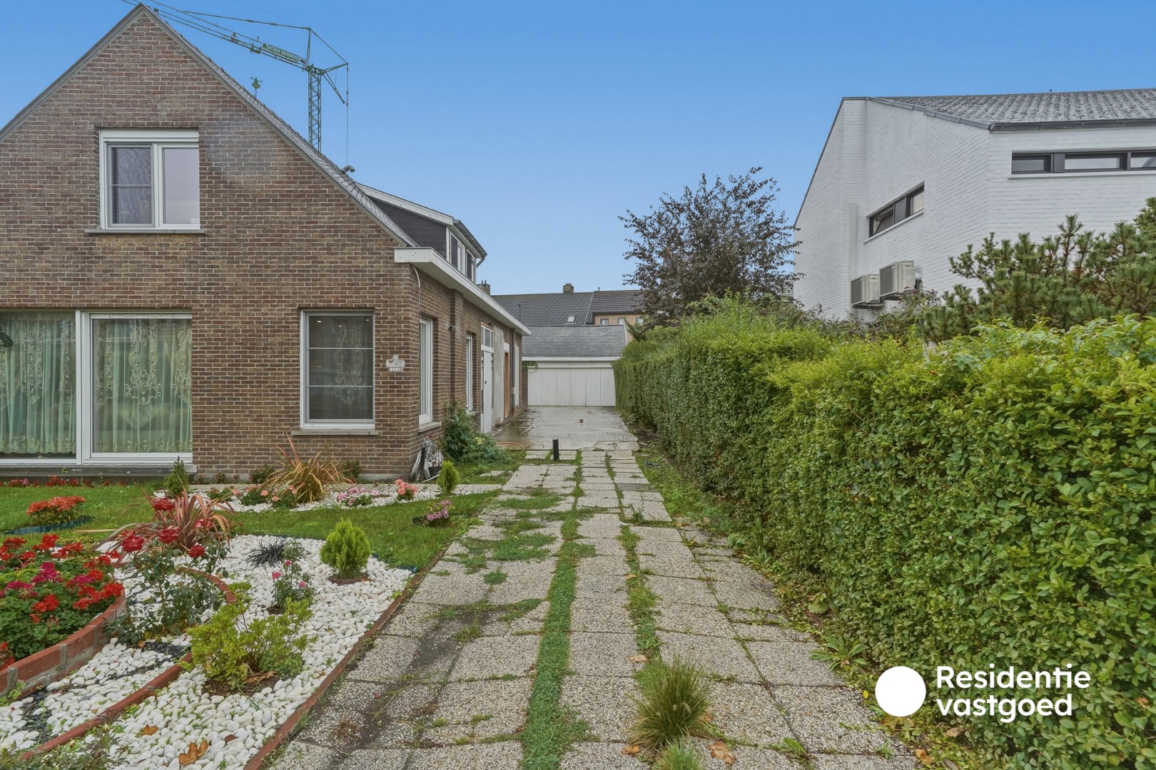 Halfopen woning met tuin en garage te koop - foto 4