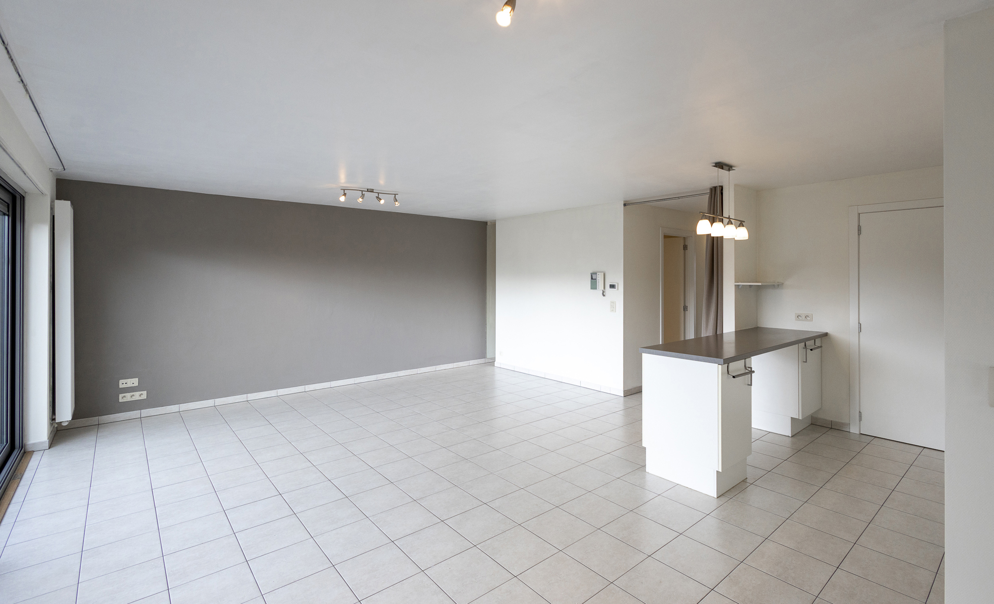 Recent gelijkvloers appartement met tuin en autostaanplaats - foto 4