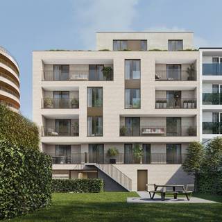 Luxeproject met ruime appartementen met een hoogwaardige afwerkingsgraad op toplocatie in het centrum van Genk.<br /><br />Project Belgiek bestaat uit 9 ruime appartementen en 1 commerciële ruimte, verdeeld over 6 bouwlagen, gelegen aan de Weg naar As 33 + 35, de voormalige locatie van café Belgiek.<br /><br />Appartement A2.2 ligt op de 2de verdieping en beschikt over een woonoppervlakte van 131,79 m² en 2 terrassen van totaal 25,69 m².<br />Indeling:<br />- inkomhal<br />- woonkamer<br />- open keuken<br />- 2 slaapkamers<br />- 2 badkamers<br />- berging<br />- toilet<br />- 2 terrassen<br /><br />Ondergronds zijn er voldoende autostaanplaatsen en bergingen voorzien. Op het gelijkvloers is er een gemeenschappelijke fietsenstalling.<br /><br />DETAILS:<br />- Toplocatie in Genk-Centrum<br />- Kleinschalig woonproject<br />- Zeer laag energielabel d.m.v. groene, hernieuwbare bronnen;<br />- Vloerverwarming, warmtepompen, hoogwaardig ventilatiesysteem, uitstekende isolatie<br />- Eigen keuze inrichting/afwerking<br />- Persoonlijk advies inzake indeling en materiaalkeuze<br />- 12 ondergrondse autostaanplaatsen<br /><br />