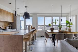 Beautifully renovated apartment with all shops and amenities within walking distance.<br /><br />Are you looking for a 2-bedroom apartment for personal use or as an investment?<br /><br />We are pleased to offer this fully renovated apartment (favorable EPC score, compliant electricity, etc.) with all the necessary comforts. It is located on the ninth floor and accessible by elevator.<br />The apartment features a spacious, bright living area with a fully equipped, high-quality kitchen, opening onto a terrace overlooking greenery.<br />There are also two spacious bedrooms, a bathroom with shower and washbasin, and a separate toilet.<br /><br />There is an optional garage available for purchase at €30 000.