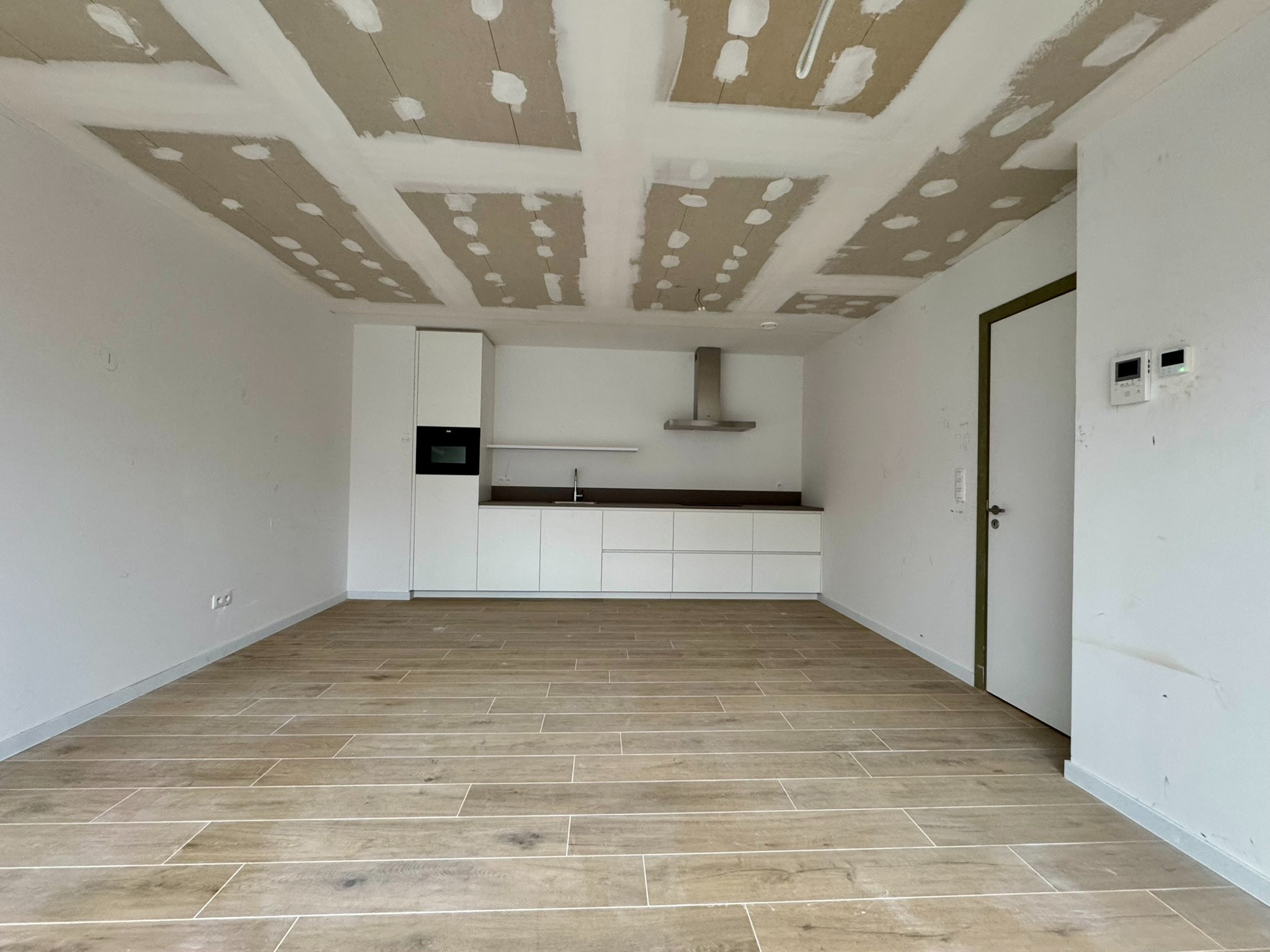 Nieuwbouwappartement (70m²) met 1 slaapkamer, staanplaats en kelderberging - foto 5