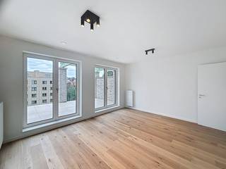 Ontdek dit prachtige appartement in het hart van de bruisende Tour & Taxis-wijk!Dit recent gebouwde éénslaapkamerappartement aan de Parkdreef...