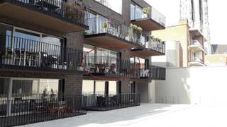 Appartement moderne avec 2 chambres à coucher, terrasse orientée sud et place de parking souterrain (P33) dans un endroit calme au cœur de...