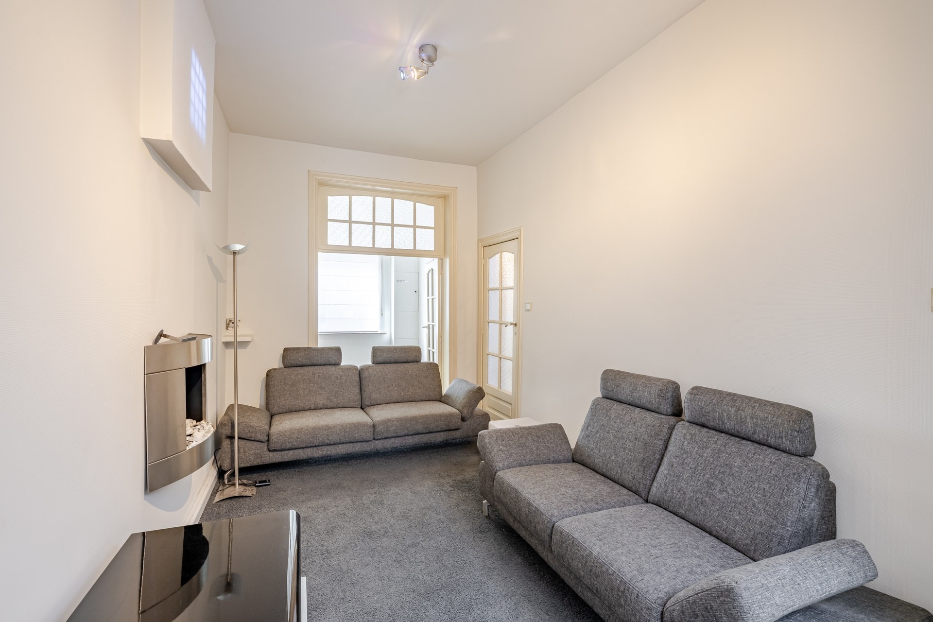 Een ruime en veelzijdige stadswoning met tuin - foto 5