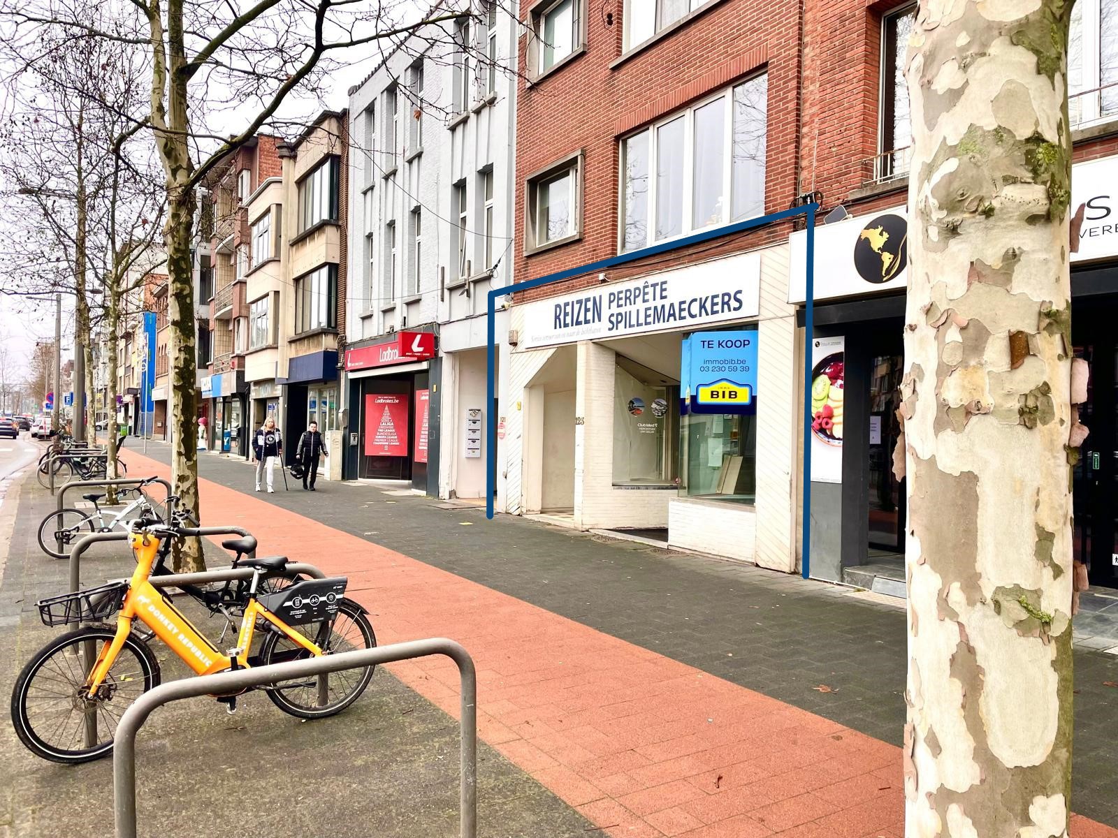 Centraal gelegen gelijkvloerse winkelruimte met tuin! - foto 1