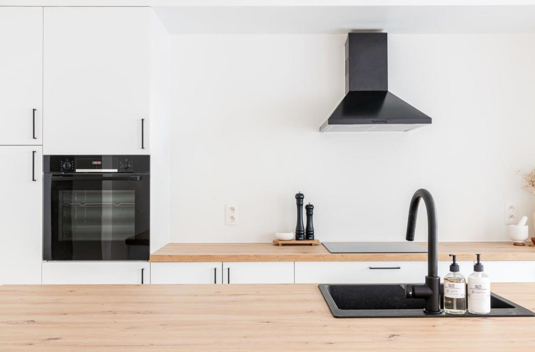 Magnifiek, volledig gerenoveerd huis met charmante stadstuin - foto 4