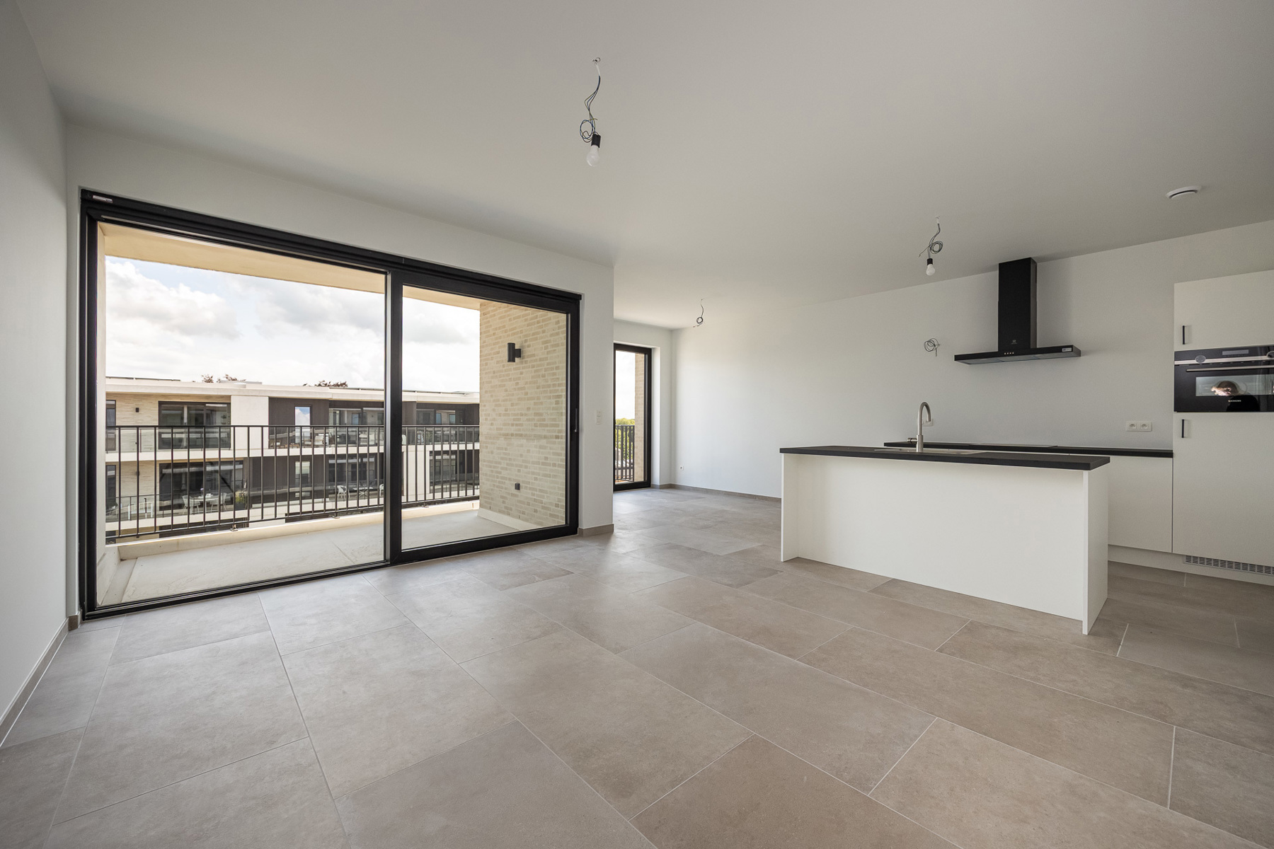 Prachtig nieuwbouwappartement op de 3de verdieping met ondergrondse autostaanplaats en berging. - foto 3