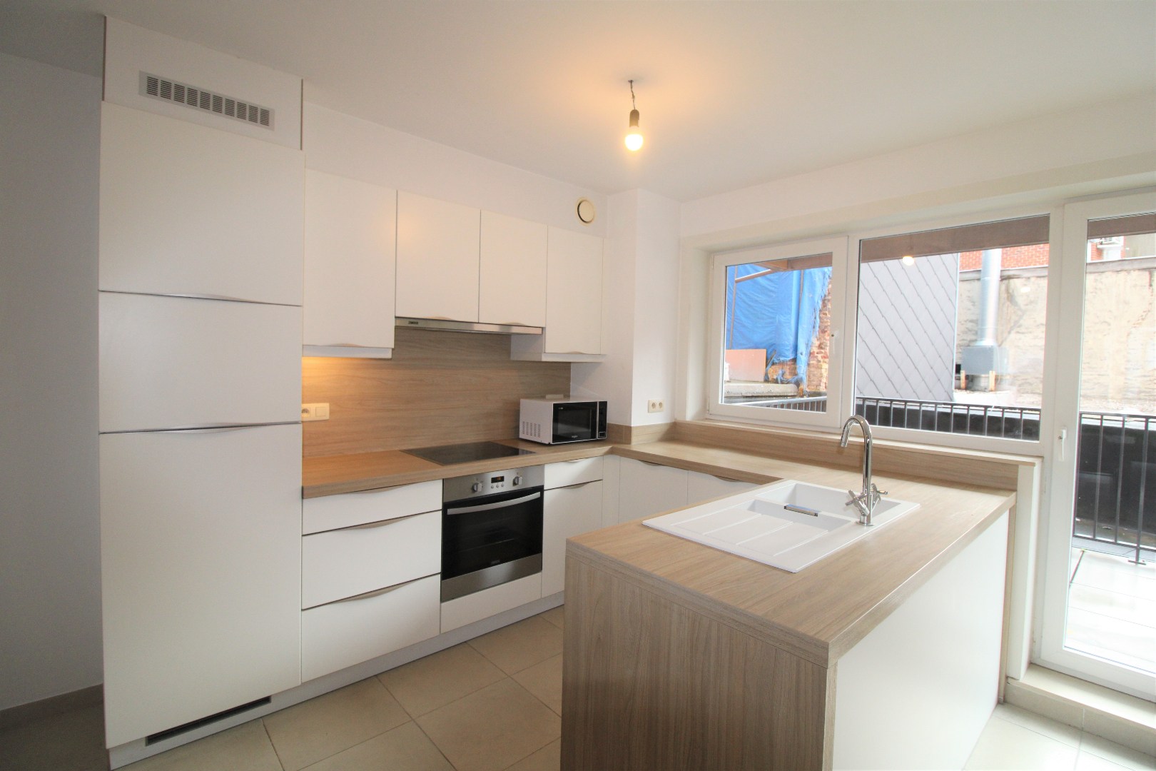 Appartement met twee slaapkamers en autostaanplaats in centrum Roeselare - foto 5