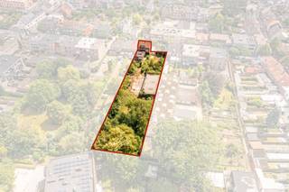 Projectgrond inclusief te renoveren of te slopen woning en magazijn in het centrum van Turnhout.