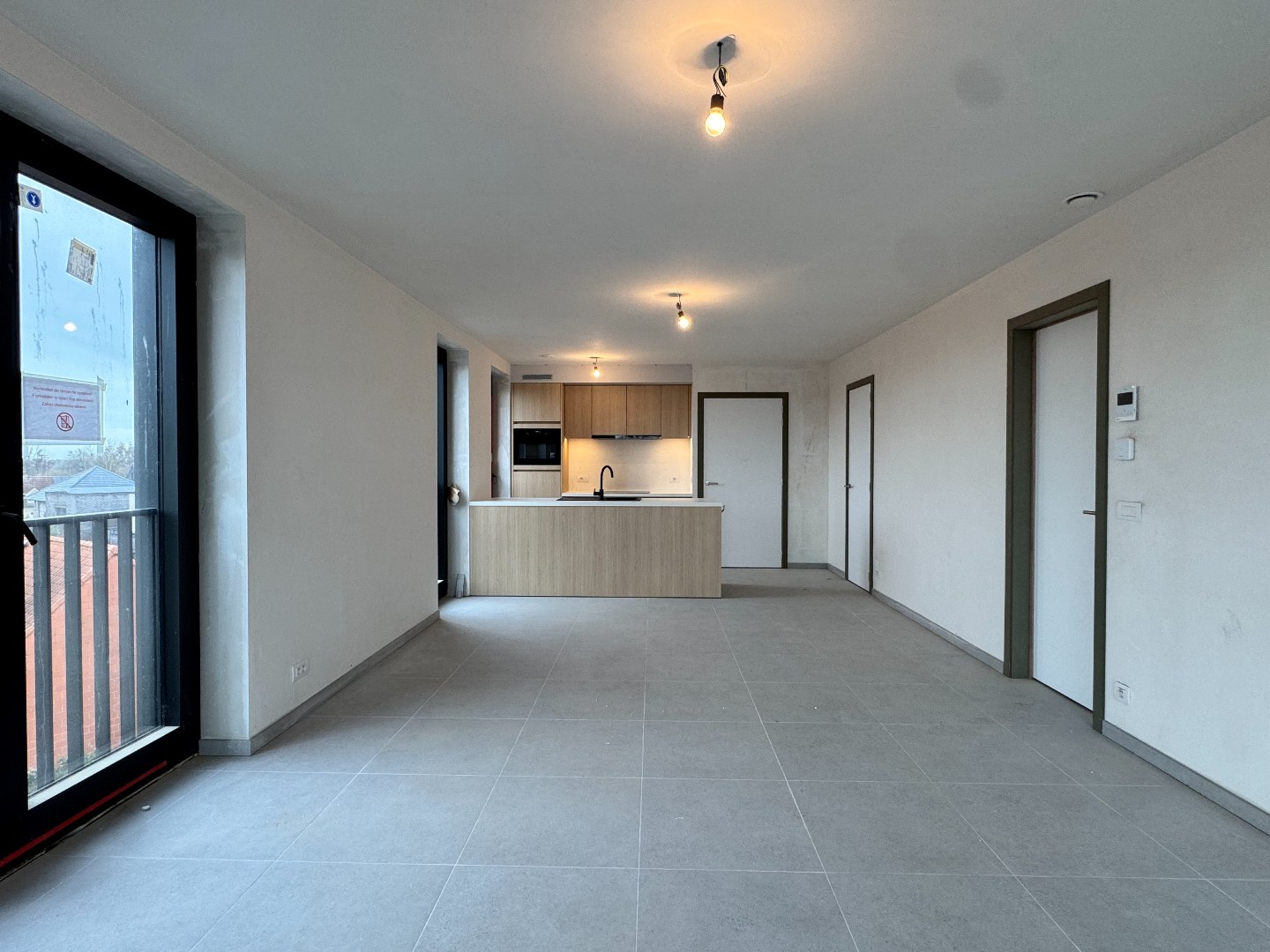 Nieuwbouwappartement met twee slaapkamers, terras en ondergrondse autostaanplaats te koop in Zulte - foto 3