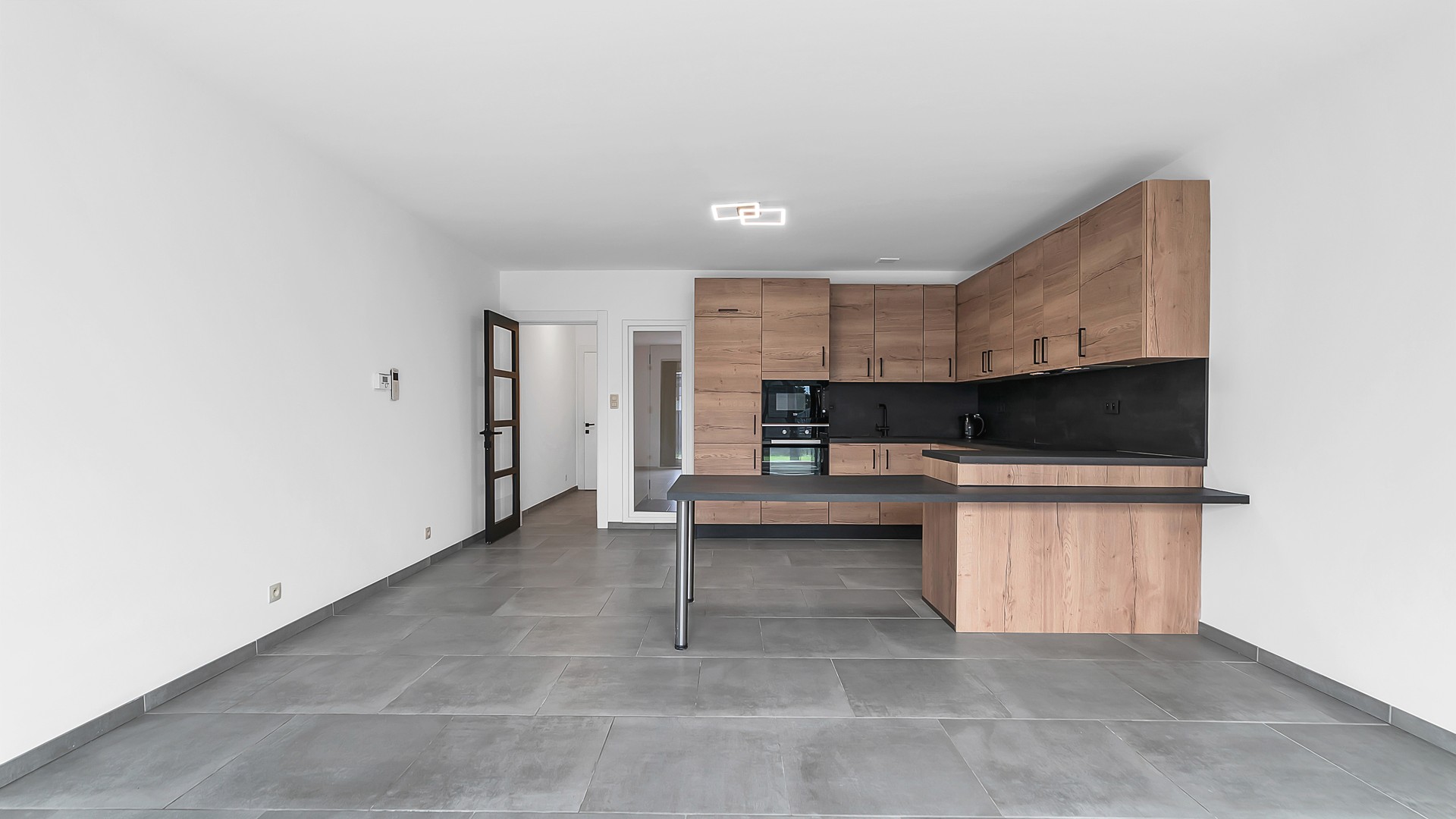 Gelijkvloers appartement met privatieve tuin, volledige onderkelderd en uitzonderlijk gunstig EPC - foto 2