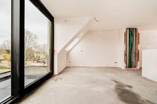 Dit ruim duplexappartement van 104 m² vinden we terug in een kleinschalige residentie nabij het centrum van Sleidinge.Het appartement is in...