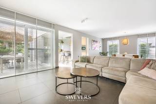 Interesse? Meer informatie op www.SWEVERS.be. - Deze instapklare open bebouwing uit 2008 ligt in een rustige, groene omgeving in Lummen, op...