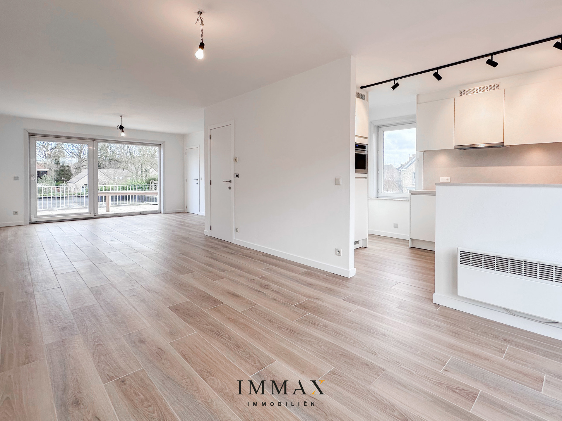 Ruim en instapklaar appartement met 2 slaapkamers en parking - foto 5