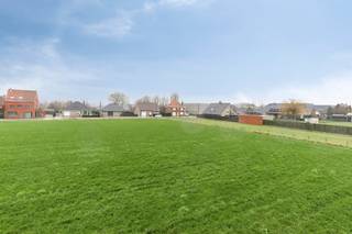 Strategically located along the Moorseelsesteenweg on the Vossemolen in Rumbeke, between house numbers 136 and 152 and near Beitem, is this subdivision with 5 spacious plots of land. The location combines easy accessibility via the N36 and E403 with the immediate vicinity of AZ Delta, Bergmolenbos, Sterrebos and the center of Rumbeke.<br /><br />LOT 1 is a plot of 1,661 m², suitable for the construction of an open building. With a street width of approximately 22 meters and a depth of approximately 86 meters, this plot offers a spacious construction area of 14 meters wide and 22 meters deep. The west-facing garden enjoys afternoon and evening sun and borders the back of an agricultural zone with a permanent open view.<br /><br />According to regulations, up to 40% of ancillary jobs linked to living are possible, ideal for the office, practice, liberal profession or services. Thanks to its location, you can enjoy optimal visibility and accessibility.<br /><br />In addition, the following lots are available in this subdivision: LOT 2 of 1,698 m², LOT 3 of 1,674 m², LOT 4 of 1,649 m² and LOT 5 of 2,176 m².<br /><br />A unique opportunity to build in a spacious and future-oriented way at a strategic location. You will soon be living here easily accessible and with a permanently open feeling thanks to the unobstructed rear view.<br /><br />The property is offered through the Power-sale formula. On 29/09/2026 between 17:00 and 18:00, you can come visit the building land by appointment and make an offer. The listed price is a starting price. For further information, please contact the property agent.