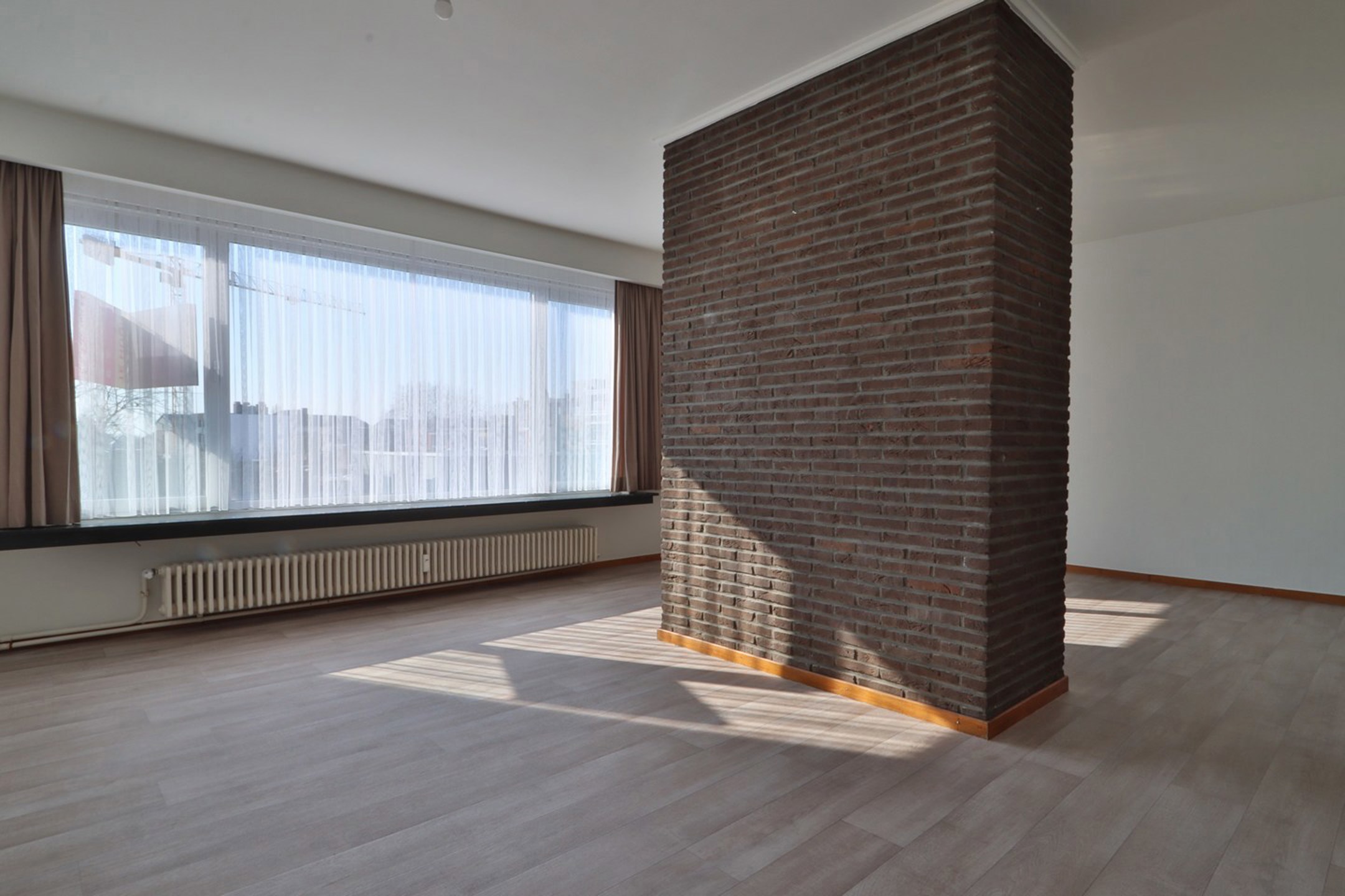 Groot en zeer lichtrijk hoekappartement met 2 slaapkamers op TOPligging in Beveren! - foto 3