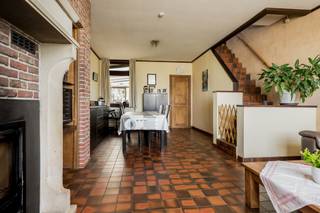 Halfopen bebouwing met mooie tuin en grote garage/atelierDeze ruime halfopen bebouwing is gelegen in een landelijke groene omgeving te Breendonk en...