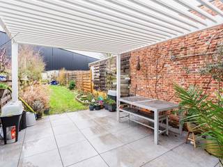 Ruime woning met moderne, volledig vergunde aanbouw, grote tuin en een zeer gunstige energiescore (EPC-label B). Deze lichtrijke woning...