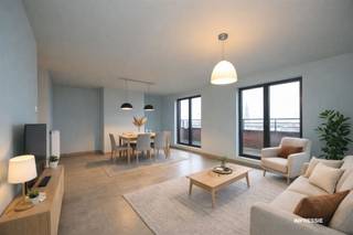 Instapklaar en Energiezuinig Dakappartement met Zuidgericht Terras en 2 ParkeerplaatsenOp de 6de en hoogste verdieping van een recente residentie...