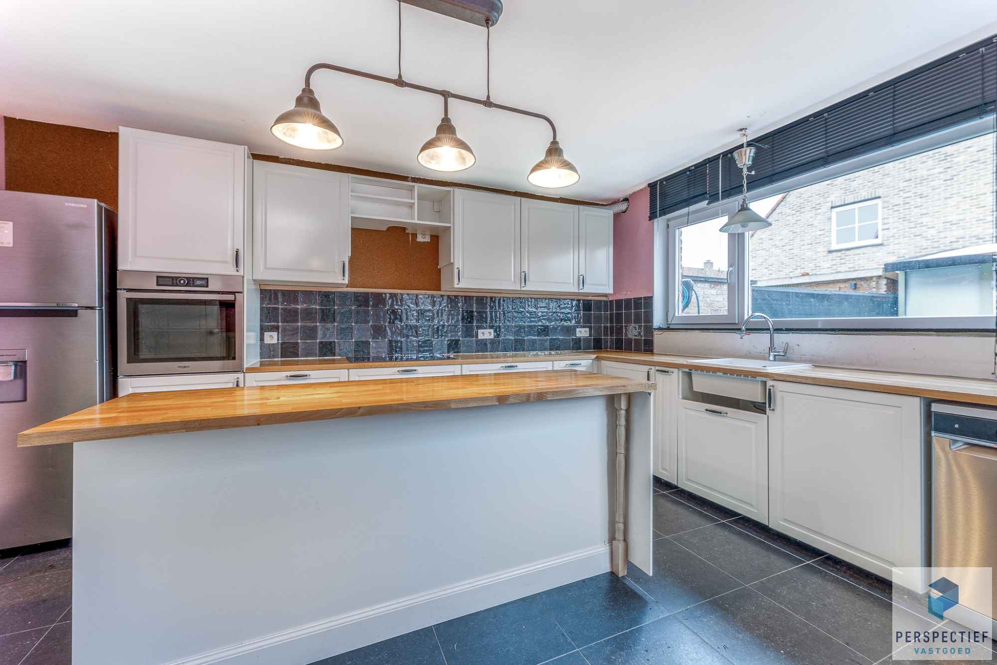 VERRASSEND RUIME en ENERGIEZUINIGE WONING met ZONGERICHTE TUIN - foto 4