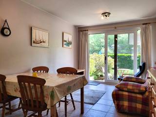 South facing 2-bedroom apartment for sale in a quiet street opposite the dune reserve, close to the beach and the seawall of OostduinkerkeThis...