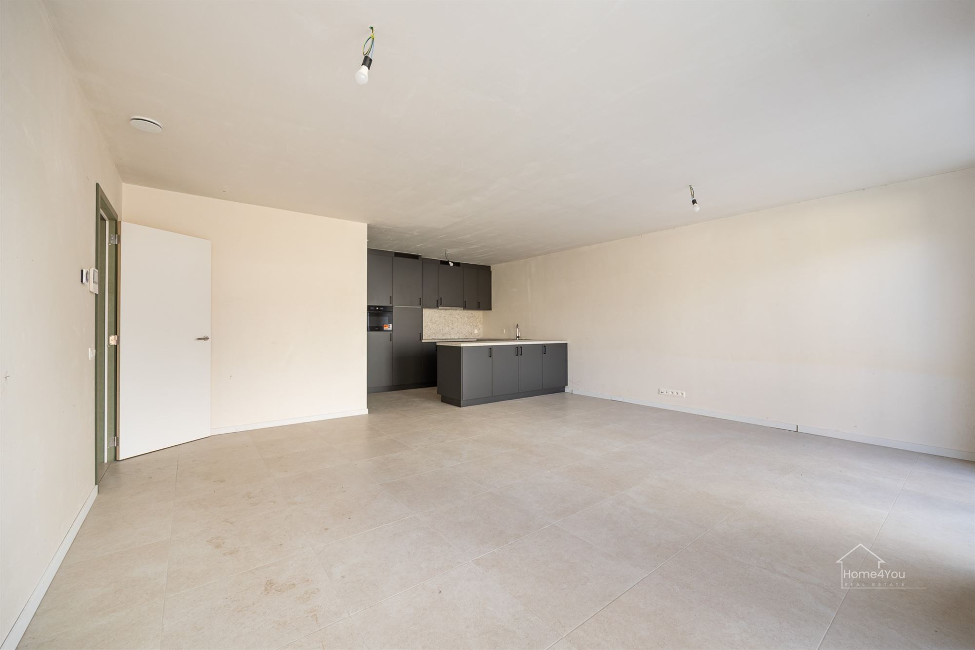 Nieuwbouw gelijkvloers appartement met aangename tuin - foto 3