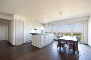 <p><span>A sea of light, a stunning view, and plenty of space—that’s what you get in this apartment in a prime location in Antwerp. Nice touches: air conditioning’s, automatic sunshades, and a large terrace overlooking greenery.</span></p><p><span> </span></p><p><span>Located in a large, well-maintained building, you enter this apartment on the fifteenth floor through a secure door. Upon entering, you’re immediately welcomed into an impressively spacious and light-filled living area. The floor-to-ceiling windows, which flow seamlessly onto the terrace, allow abundant natural light to flood in and create an exceptional sense of space. The continuous hardwood flooring lends a stylish and harmonious look throughout the entire apartment. The absolute highlight is undoubtedly the stunning view, which immediately catches the eye and gives this living space a unique character.</span></p><p><span> </span></p><p><span>Open Kitchen and Terrace with a View</span></p><p><span>The open kitchen combines a stylish look with optimal functionality and is fully equipped. Thanks to the spacious kitchen island and numerous storage cabinets, you’ll have more than enough work and storage space. The kitchen is also equipped with a refrigerator, a full-size freezer, an oven, a 6-burner gas stove, a double sink, and a dishwasher. From the living area and the open kitchen, you have direct access to the terrace, which stretches across the entire width of the apartment. Here, you can enjoy an exceptional view of the city in complete tranquility. The iconic skyline—featuring the Ferris wheel, the Butterfly Palace, the Rabbit Meadow, and even the Scheldt River—is undoubtedly one of the greatest assets of this unique home.</span></p><p><span> </span></p><p><span>Bathroom and 2 bedrooms</span></p><p><span>Through the night hall, you reach the two full-sized bedrooms and the stylish bathroom. The first bedroom is located on the right and is ideal as a children’s room, guest room, or home office. At the rear is the spacious master bedroom, which also offers direct access to the terrace. Both bedrooms are pleasantly spacious and filled with natural light, and feature the same high-quality hardwood flooring as the living area. They are also equipped with automatic window shades, providing extra comfort and privacy.</span></p><p><span>The stylish bathroom is finished with modern gray XL tiles and exudes tranquility and elegance. It features a bathtub with a rain shower, a double vanity with two sink's and practical base cabinets, a towel radiator, and a toilet.</span></p><p><span> </span></p><p><span> </span></p><p><span>Across from the Vlinderpaleis, near the Leien and the Troonplaats</span></p><p><span>You’re right in the heart of the Zuid neighborhood here, with the Vlinderpaleis just across the street. The Leien are nearby, as are the highway on-ramp and the Singel. On Troonplaats and the surrounding streets, you’ll find plenty of restaurants, cafes, and neighborhood shops, and the KdG University of Applied Sciences’ Zuid campus is just around the corner. When it comes to public transportation, you’re spoiled for choice: bike-share station, bus, or tram?</span></p><p><span> </span></p>