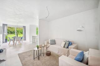 Deze moderne halfopen nieuwbouwwoning (links) is gelegen nabij het centrum van Booischot, dicht bij openbaar vervoer, scholen, supermarkten en...
