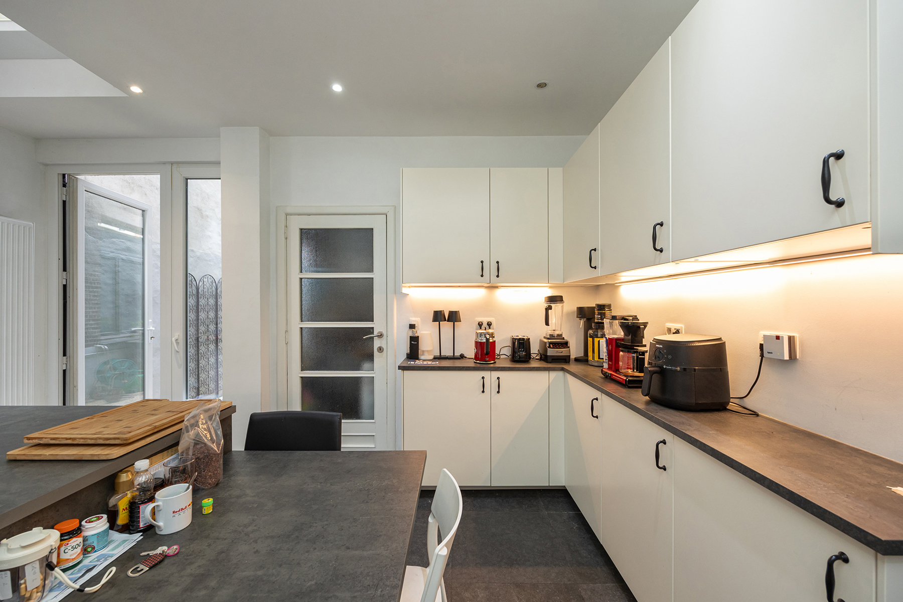 Karaktervol gelijkvloers appartement met tuin - foto 4