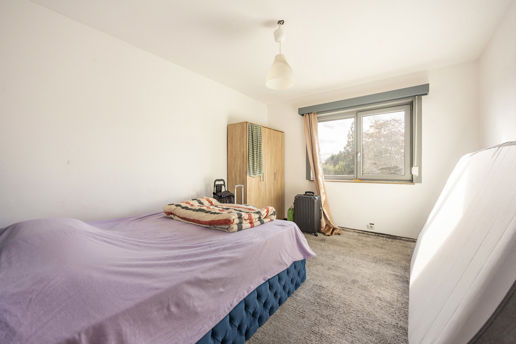 Een appartement op de tweede verdieping links met terras, autostaanplaats en garage. - foto 4