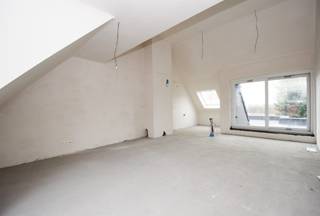 Ruim dakappartement in het hartje van Sint-Gillis-Waas (103m²) - MOGELIJKHEID AANKOOP AAN 6% BTW, INFORMEER NAAR DE VOORWAARDEN - Dit betreft een...