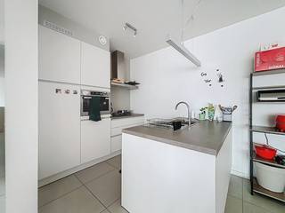 Graag presenteren wij jou dit nieuwbouwappartement met 2 slaapkamers in het centrum van Aalter. Interesse om te wonen in deze hippe buurt bij...