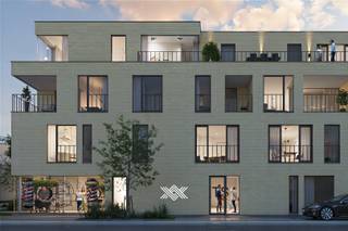Dit appartement op de tweede verdieping heeft een bewoonbare oppervlakte van 100 m² en een terras van 9 m². Via de ruime inkomhal heeft u toegang tot een lichtrijke leef- en eetruimte en de open keuken met aansluitend een handige berging. Verder vindt u er twee slaapkamers waarvan de master bedroom een dressing heeft, een afzonderlijk toilet en een badkamer met een inloopdouche en lavabo. Ondergronds is er een private parkeerplaats met een handige berging voorzien. <br /><br />Wondelaer bestaat uit 11 hedendaagse appartementen verspreid over drie verdiepingen. Met keuze uit 1, 2 of 3 slaapkamers biedt het gebouw verschillende mogelijkheden voor uiteenlopende woonbehoeften. Bovendien beschikt elk appartement over een eigen terras waar u in alle rust kan genieten van de zon. Het gebouw heeft een grote ondergrondse verdieping met open parkeerplaatsen, ruime bergingen en een fietsenstalling, allen gemakkelijk bereikbaar via de lift.<br /><br />De appartementen zijn uitgerust met energiezuinige technologieën, vrij van fossiele brandstoffen. De individuele warmtepomp, de balansventilatie en de privatieve PV-panelen zorgen voor lage energiekosten en dragen bij aan een groenere toekomst. <br /><br />Gelegen nabij de kern van Wondelgem vindt u er alle voorzieningen op wandel- en fietsafstand gaande van diverse scholen en winkels tot parken en culturele activiteiten. <br /><br />Verlaagd BTW-tarief van 6% mogelijk op de volledige constructiewaarde.