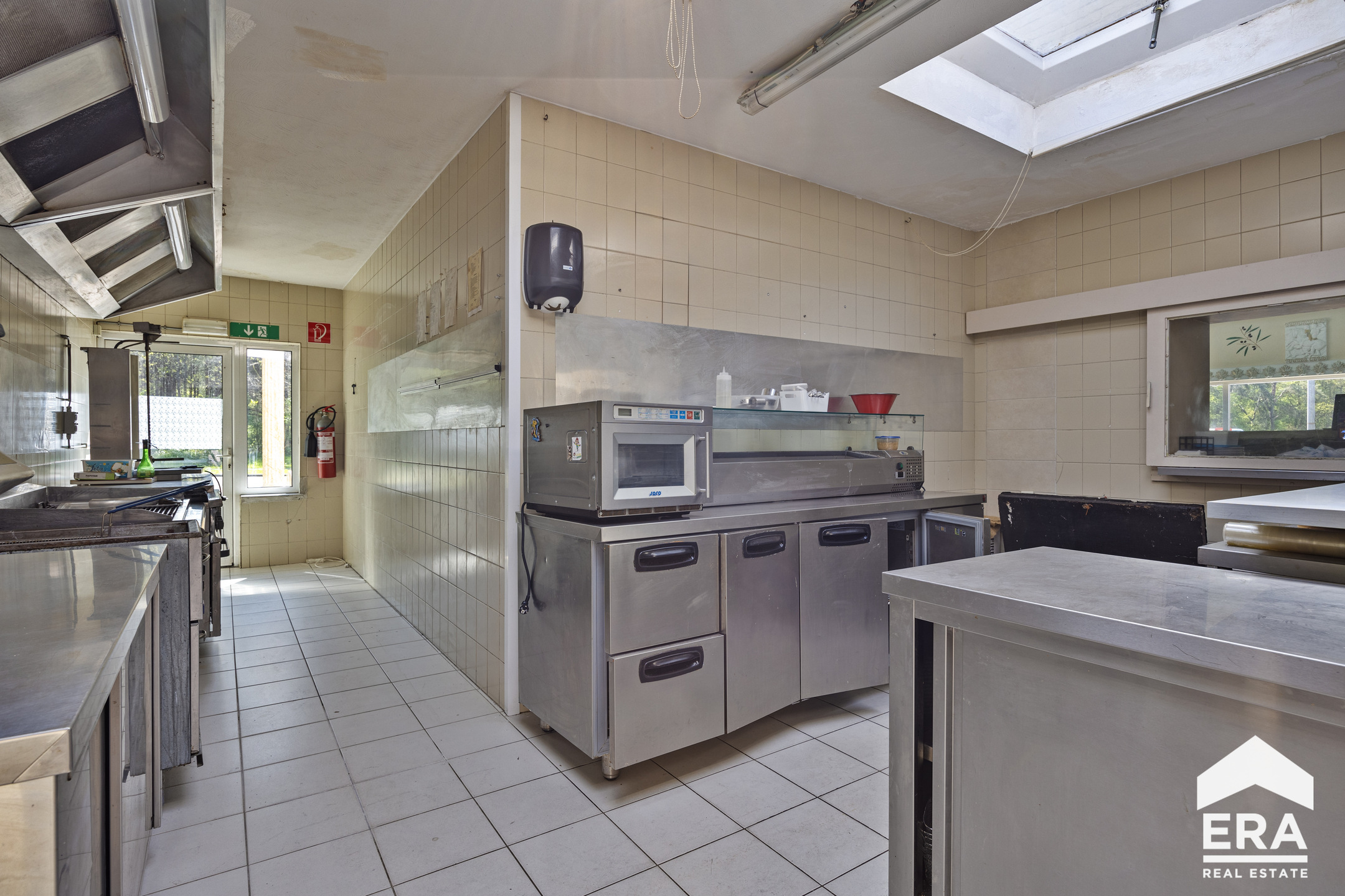 Ruime handelswoonst met 3 slaapkamers dichtbij Bosland - foto 5