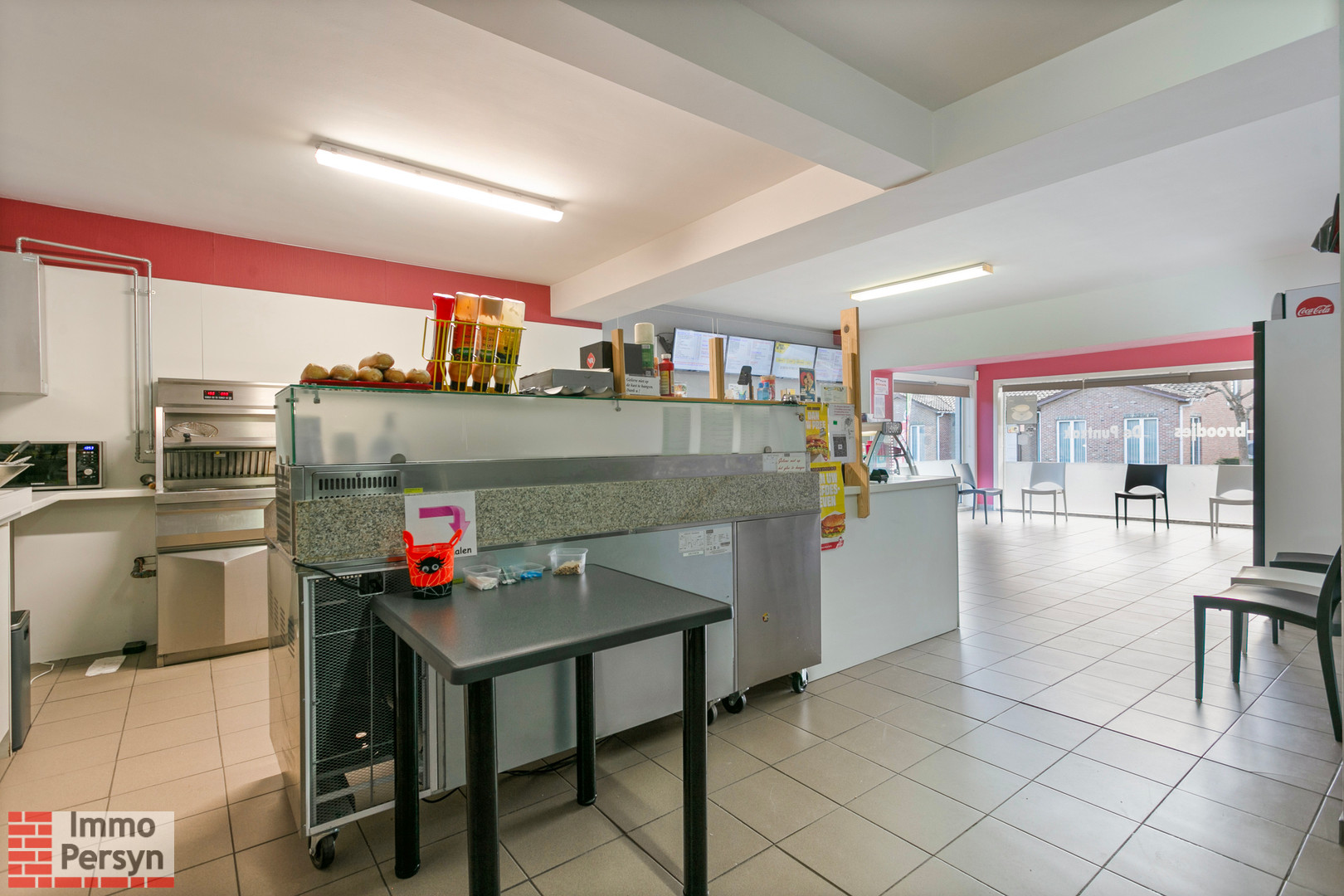 Handelspand met bovenliggend appartement en achterliggende bouwgrond. - foto 5