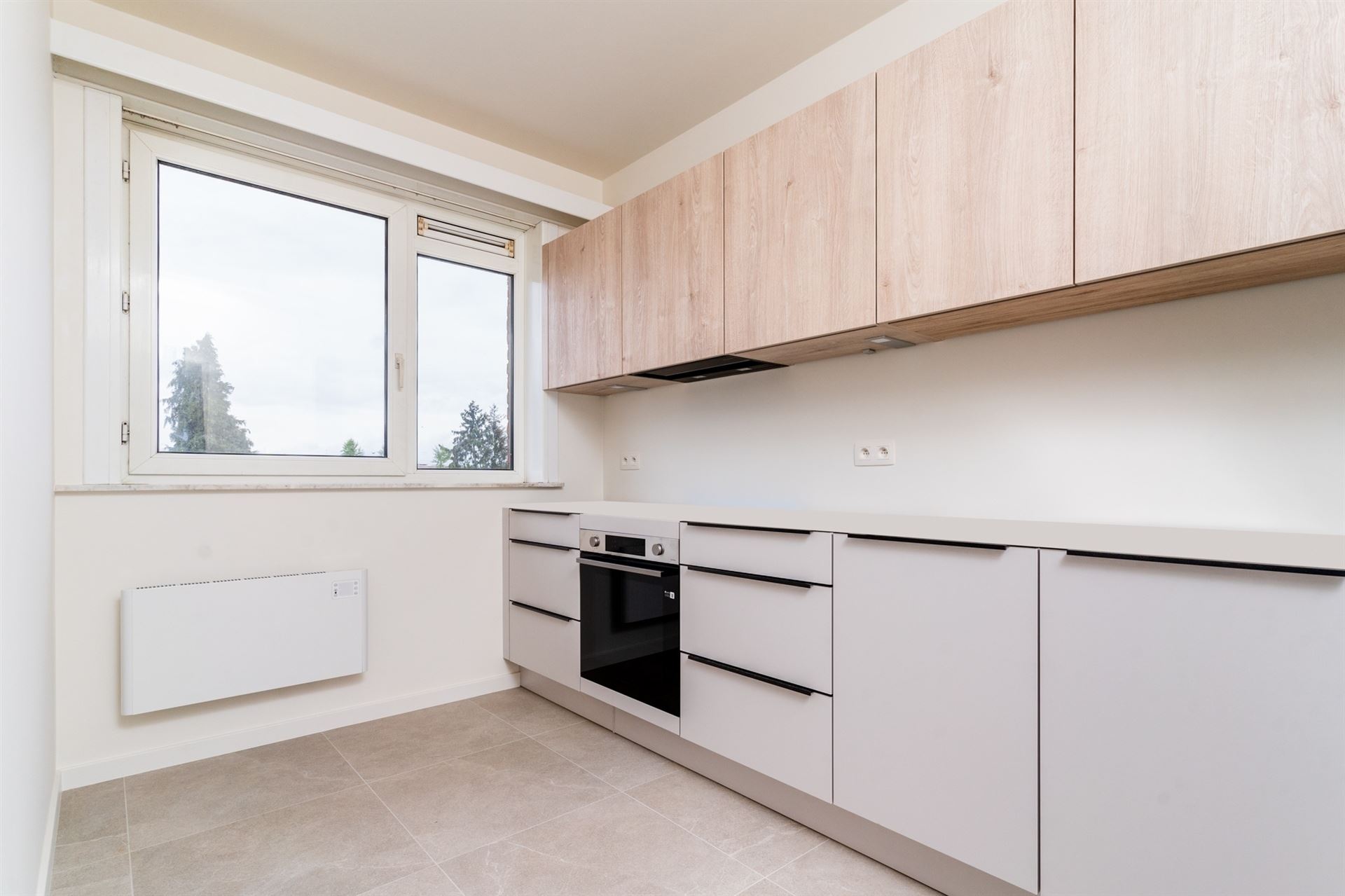 Lichtrijk 3 slpk appartement met balkon en autostaanplaats - foto 3