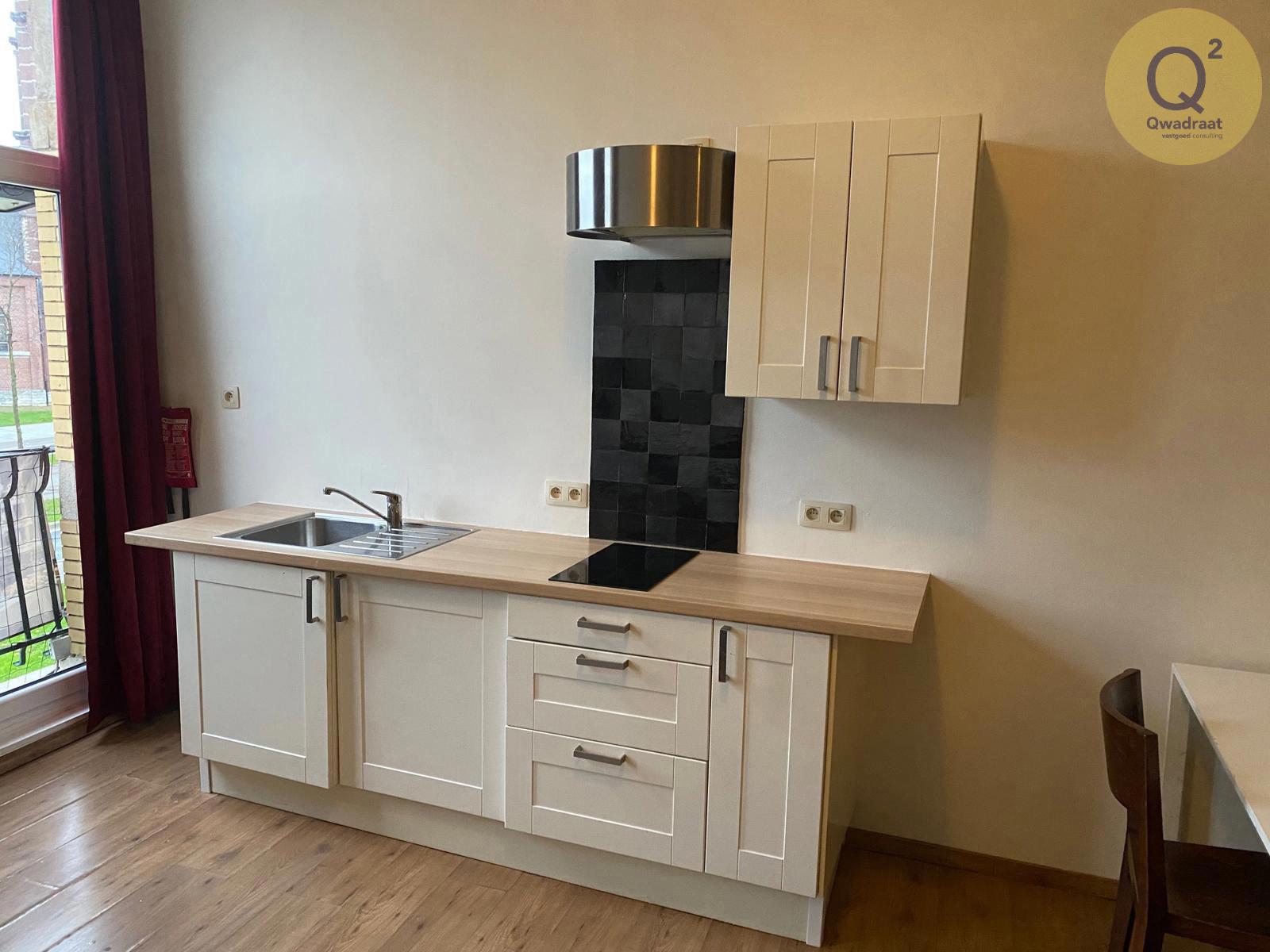 Riant opbrengsteigendom met handelspand op de Bredabaan te Merksem - foto 4