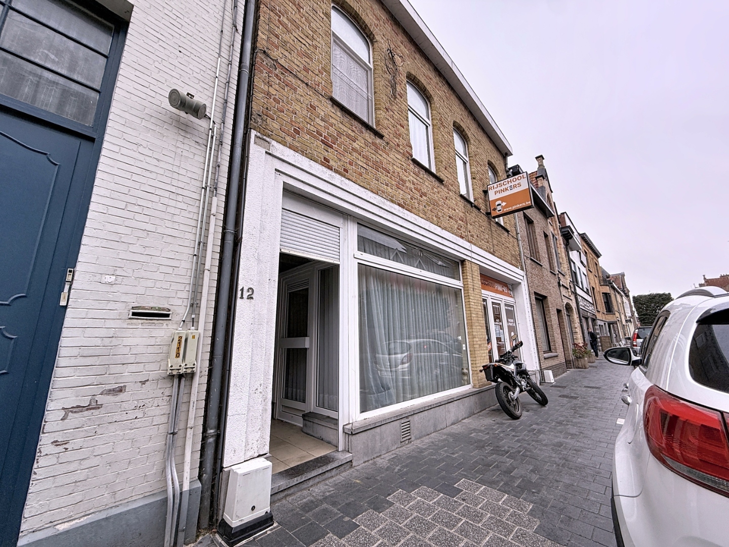 Investeringspand bestaande uit drie appartementen en handelspand in centrum Nieuwpoort - foto 2