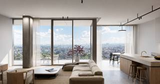 <p>Op de 26e verdieping van de iconische Antwerp Tower bevindt zich dit exclusieve Serenity-appartement van 146 m². De royale leefruimte en grote glaspartijen creëren een uitzonderlijke woonbeleving met indrukwekkende panoramische zichten over Antwerpen. Het appartement beschikt over 2 slaapkamers en 2 badkamers en combineert ruimte, privacy en een unieke ligging boven de stad.</p>
<p>Het appartement wordt momenteel onafgewerkt aangeboden. Voor meer informatie over de mogelijke afwerkingskeuzes en personalisatie kunt u contact opnemen met BROCOR.</p>
<p></p>