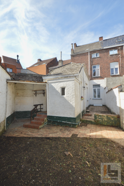 Te renoveren tweegevelwoning met 5 slpks + tuin - foto 2