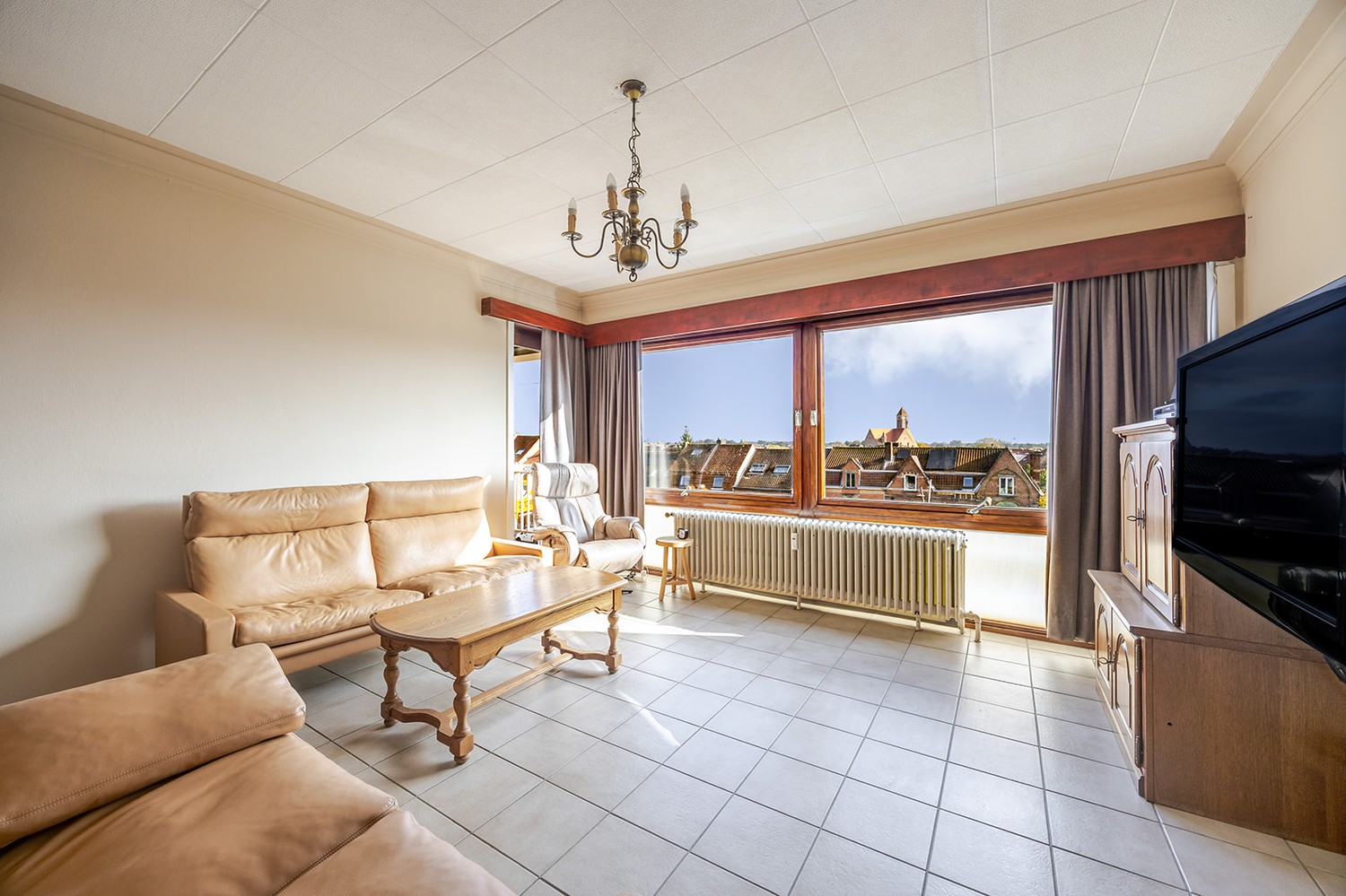 Lichtrijk 2 slaapkamer appartement met TERRAS én GARAGE op CENTRALE LIGGING - foto 4