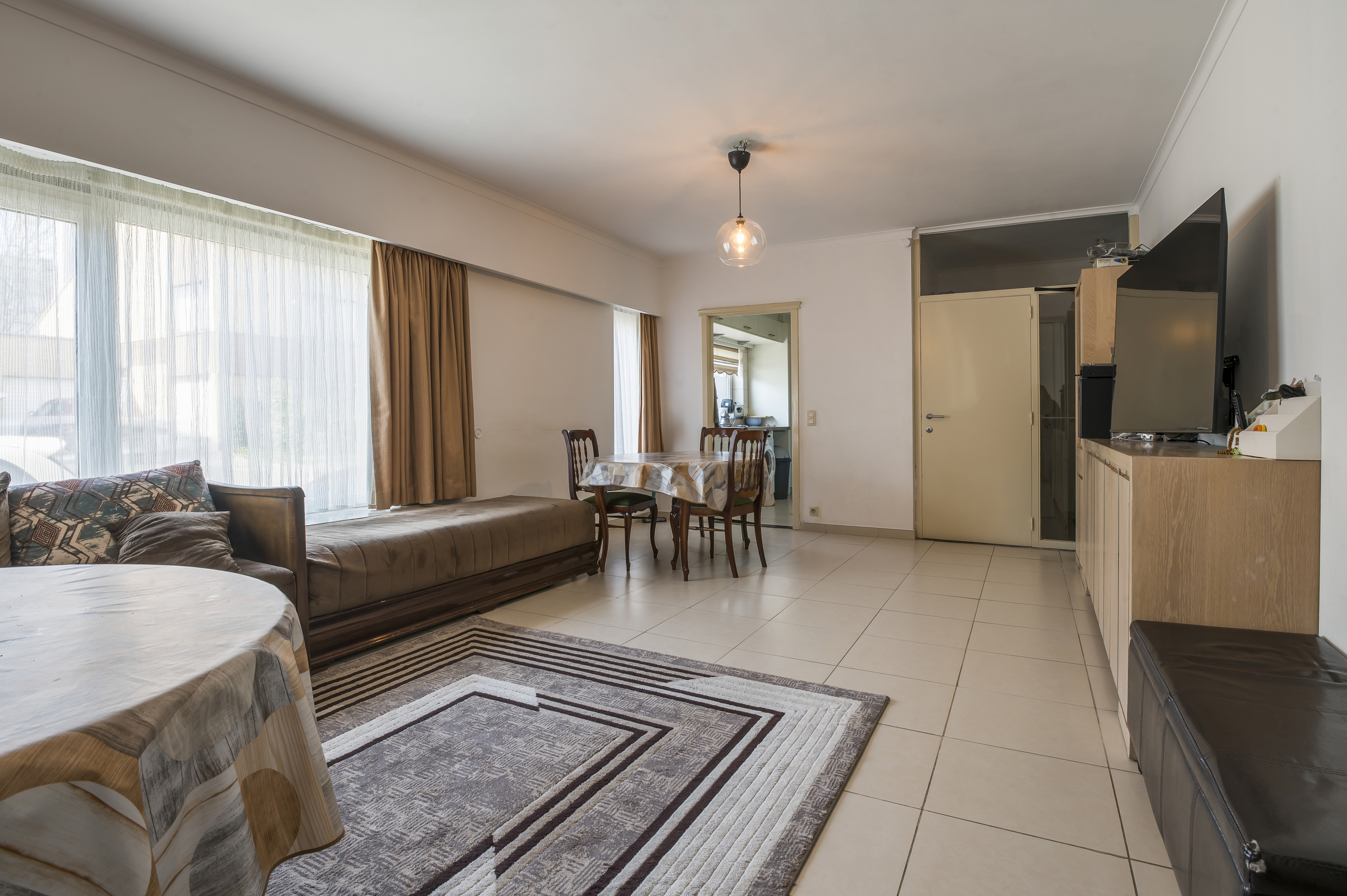 Gelijkvloers appartement met 3 slaapkamers en garage - foto 2